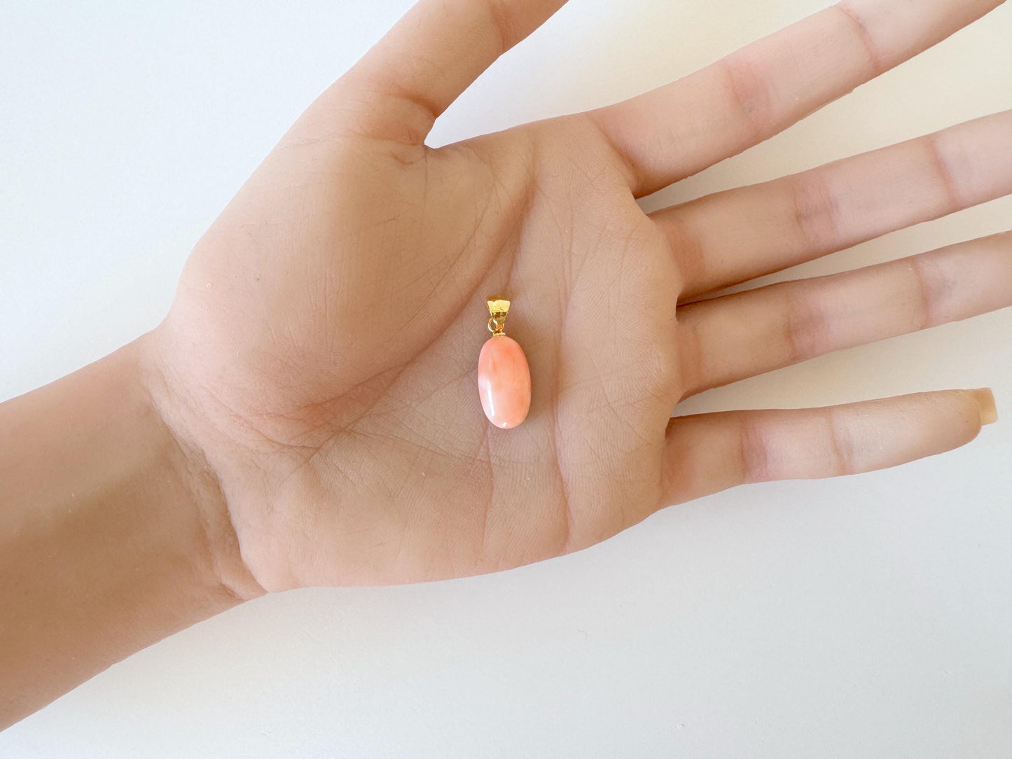 Natural Deep Sea Coral Oval Cabochon Pendant, 15.6x9mm, Natural Pink/Orange color coral, Silver (Gold-Plated) bail