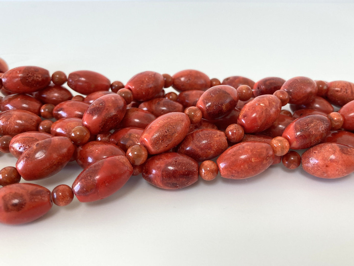 Sponge Coral Oval Beads (Barrel shape) with Round Beads / 16x10mm Oval / 5.5mm Round / sold by a Half Strand