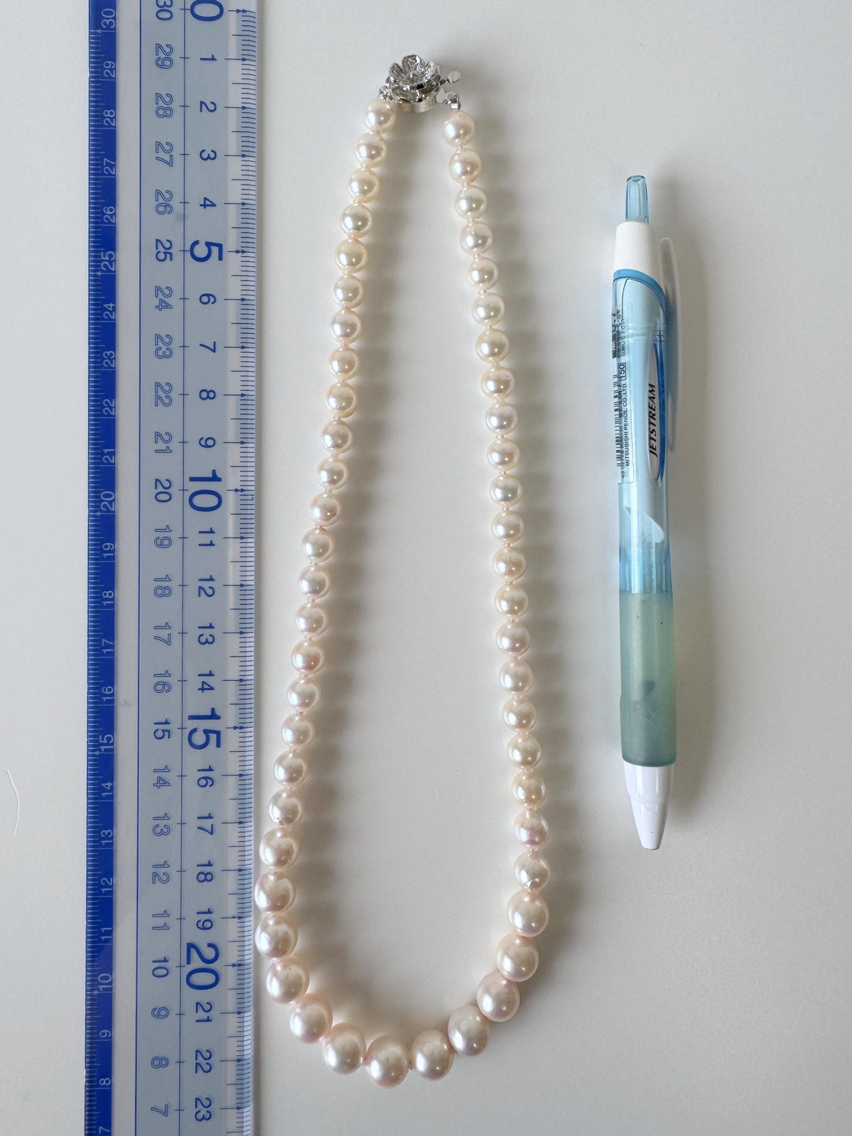 Japanese Akoya Pearl Necklace: White/Slightly Pink 6.8-9.3mm Cultured Strand, Silver Clasp | Saltwater Gems, 45cm Length
