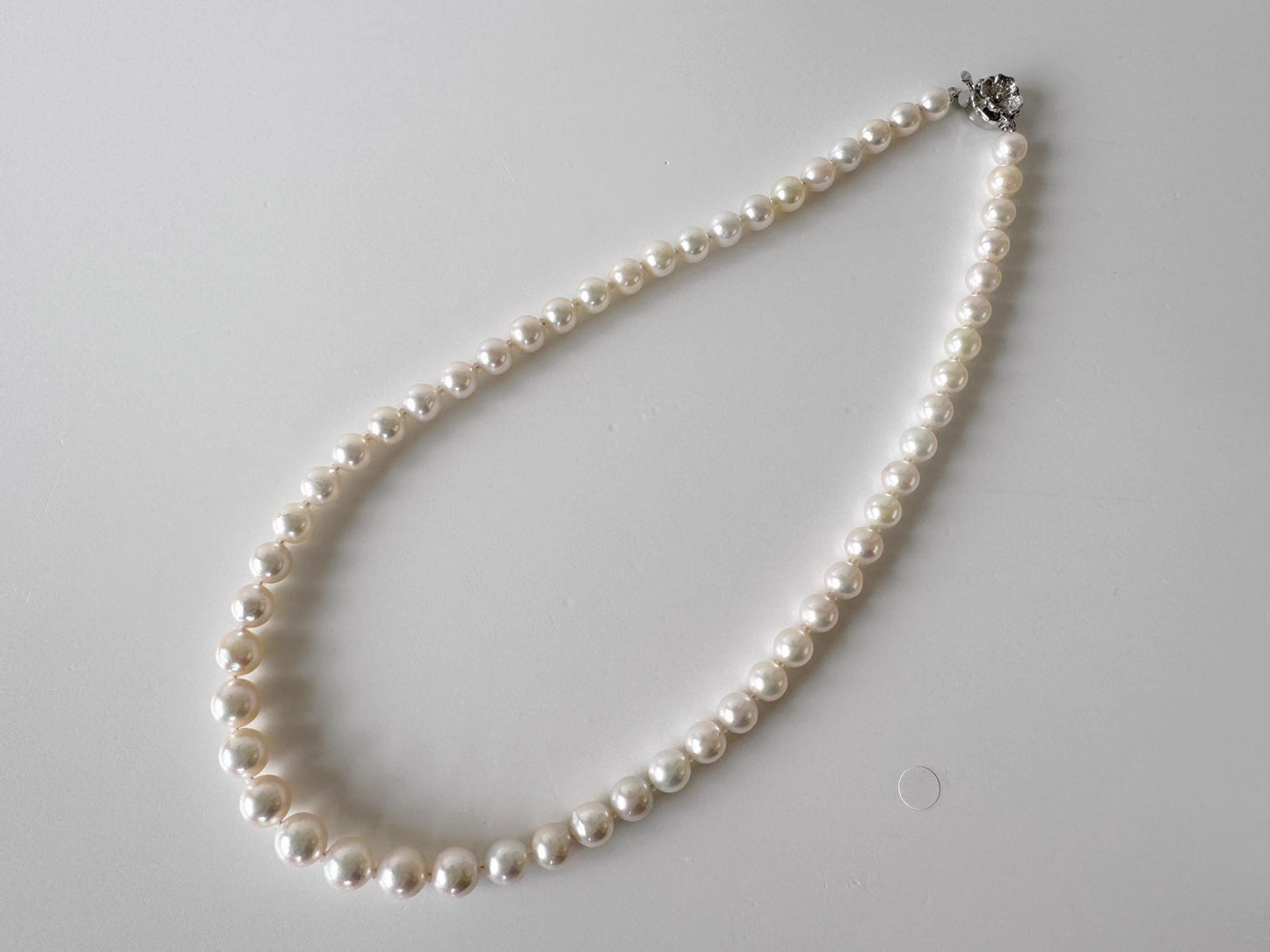 Japanese Akoya Pearl Necklace: White/Slightly Pink 6.9-9.3mm Cultured Strand, Silver Clasp | Saltwater Gems, 47cm Length