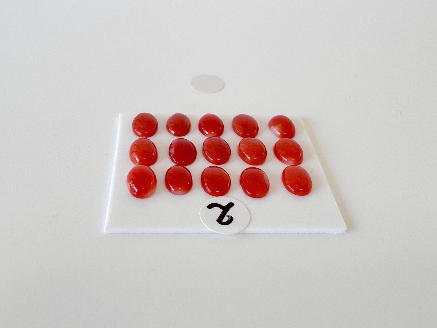 Natural Japanese Aka (Red) Coral Cabochons: 7x5mm Oval, Set of 15