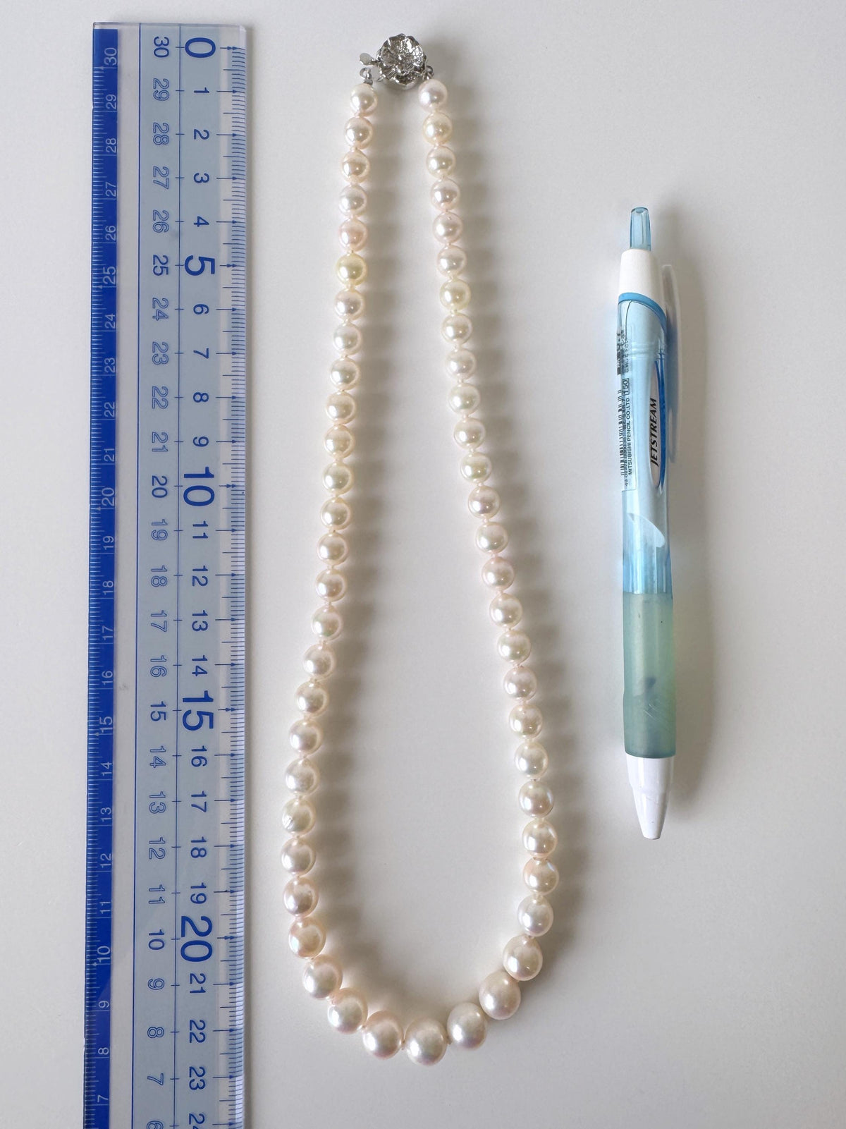 Japanese Akoya Pearl Necklace: White/Slightly Pink 6.9-9.3mm Cultured Strand, Silver Clasp | Saltwater Gems, 47cm Length