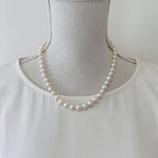 Japanese Akoya Pearl Necklace: White/Slightly Pink 6.9-9.3mm Cultured Strand, Silver Clasp | Saltwater Gems, 47cm Length