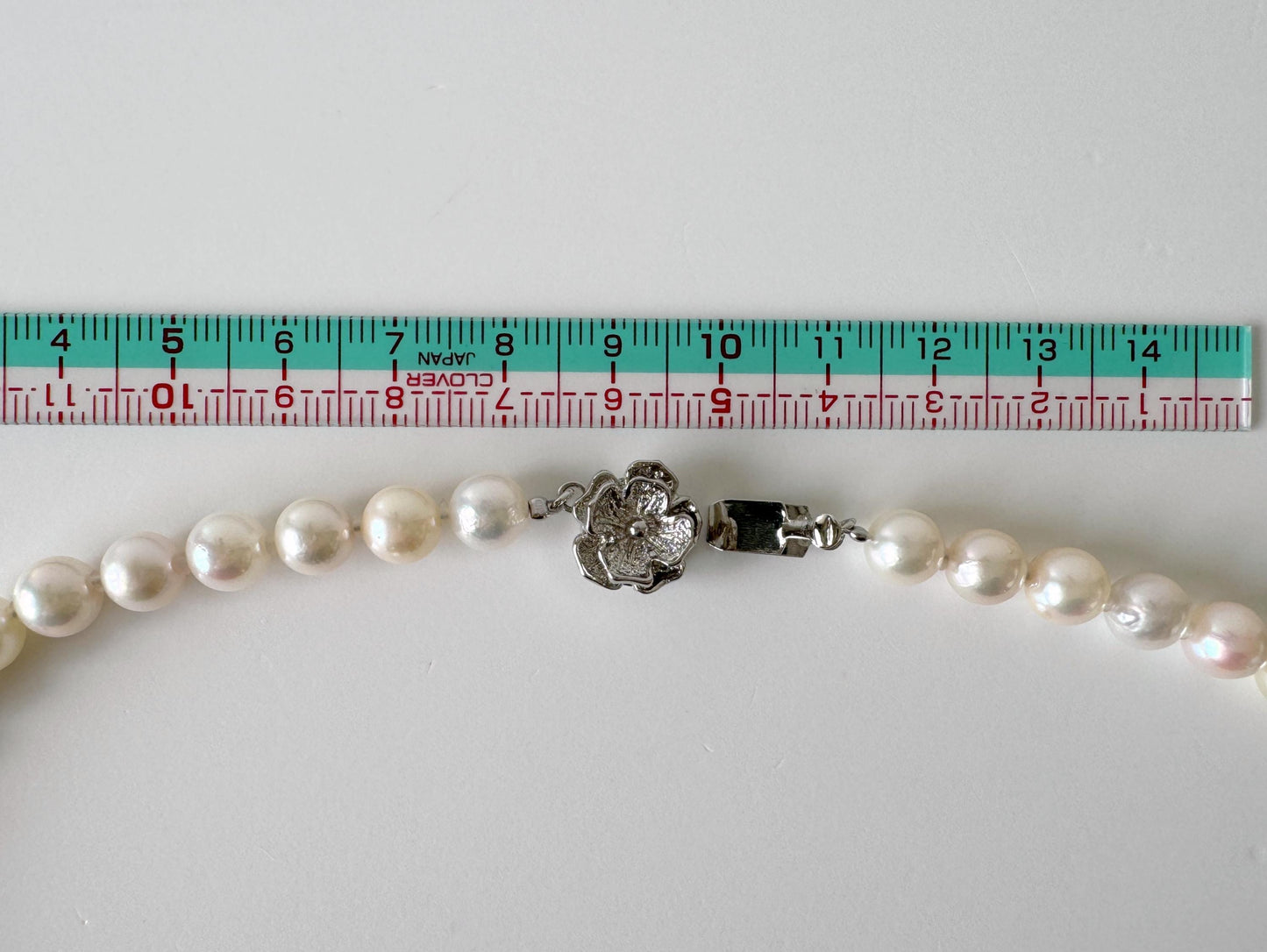 Japanese Akoya Pearl Necklace: White/Slightly Pink 6.9-9.3mm Cultured Strand, Silver Clasp | Saltwater Gems, 47cm Length