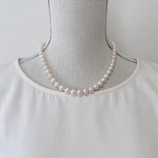Japanese Akoya Pearl Necklace: White/Slightly Pink 6.8-9.3mm Cultured Strand, Silver Clasp | Saltwater Gems, 45cm Length