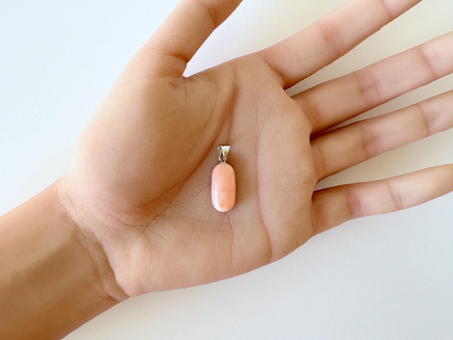 Natural Deep Sea Coral Oval Cabochon Pendant, 17x8.8mm, Natural Pink/Orange color coral, Silver (Rhodium-Plated) bail