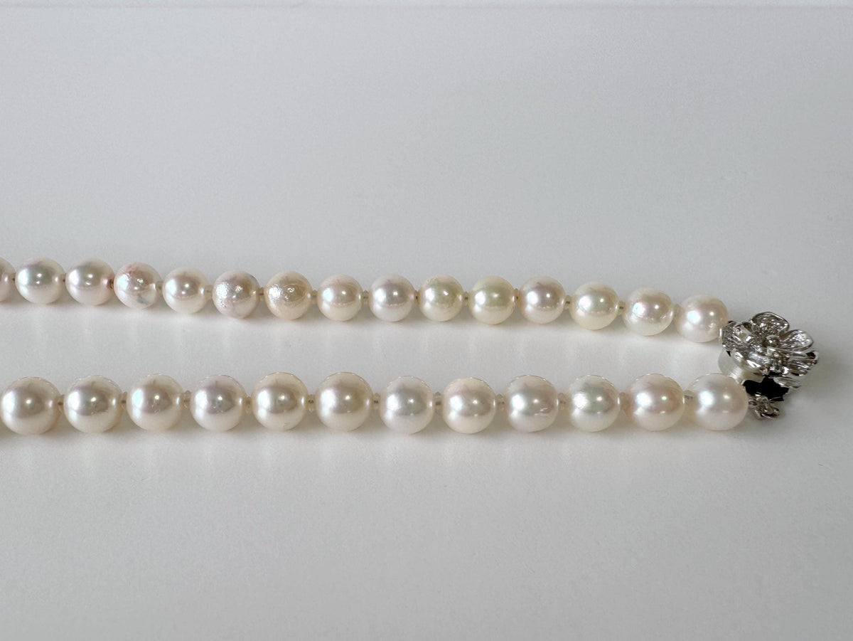 Japanese Akoya Pearl Necklace: White/Slightly Pink 6.8-9.3mm Cultured Strand, Silver Clasp | Saltwater Gems, 45cm Length