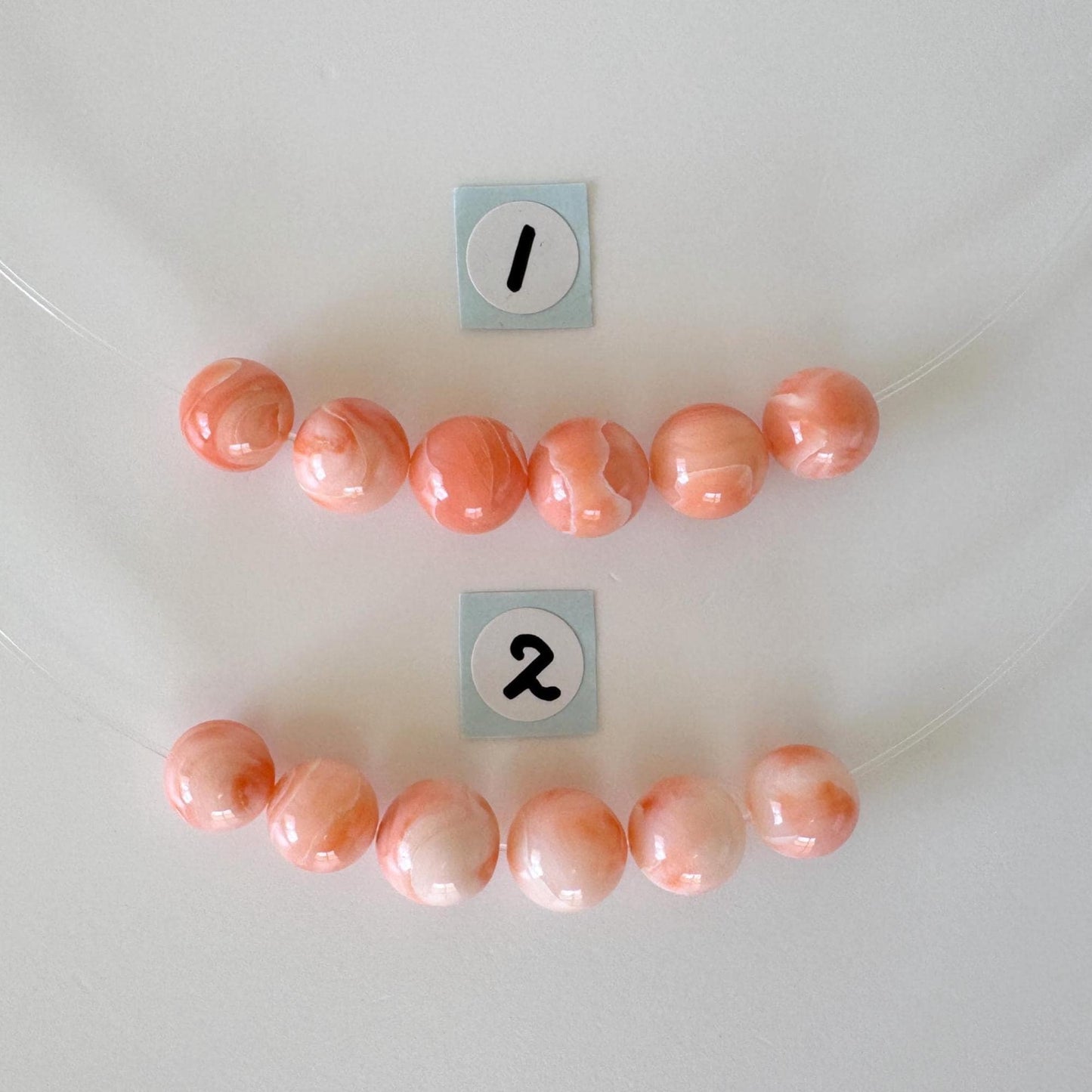 Short strand (6pc) of Natural Deep sea coral round beads 7.5-8.4mm, natural Pink/Orange color coral