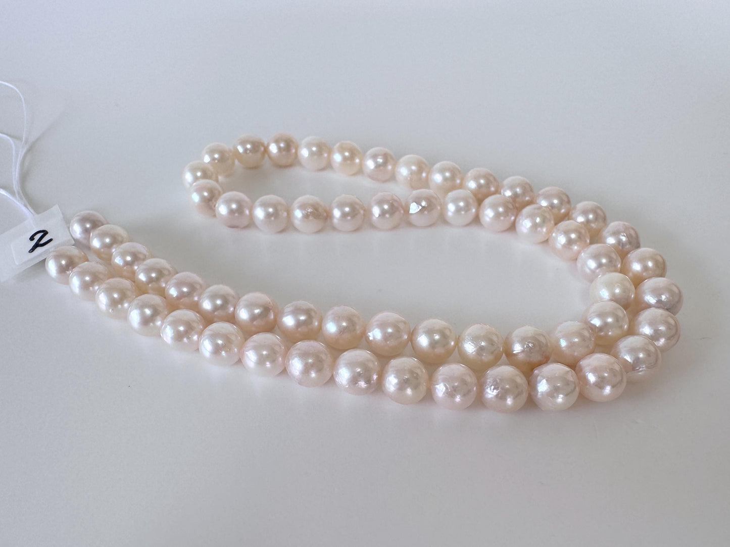 Akoya Pearl Strand: 6.5-7mm White/Pink Cultured Saltwater Pearls
