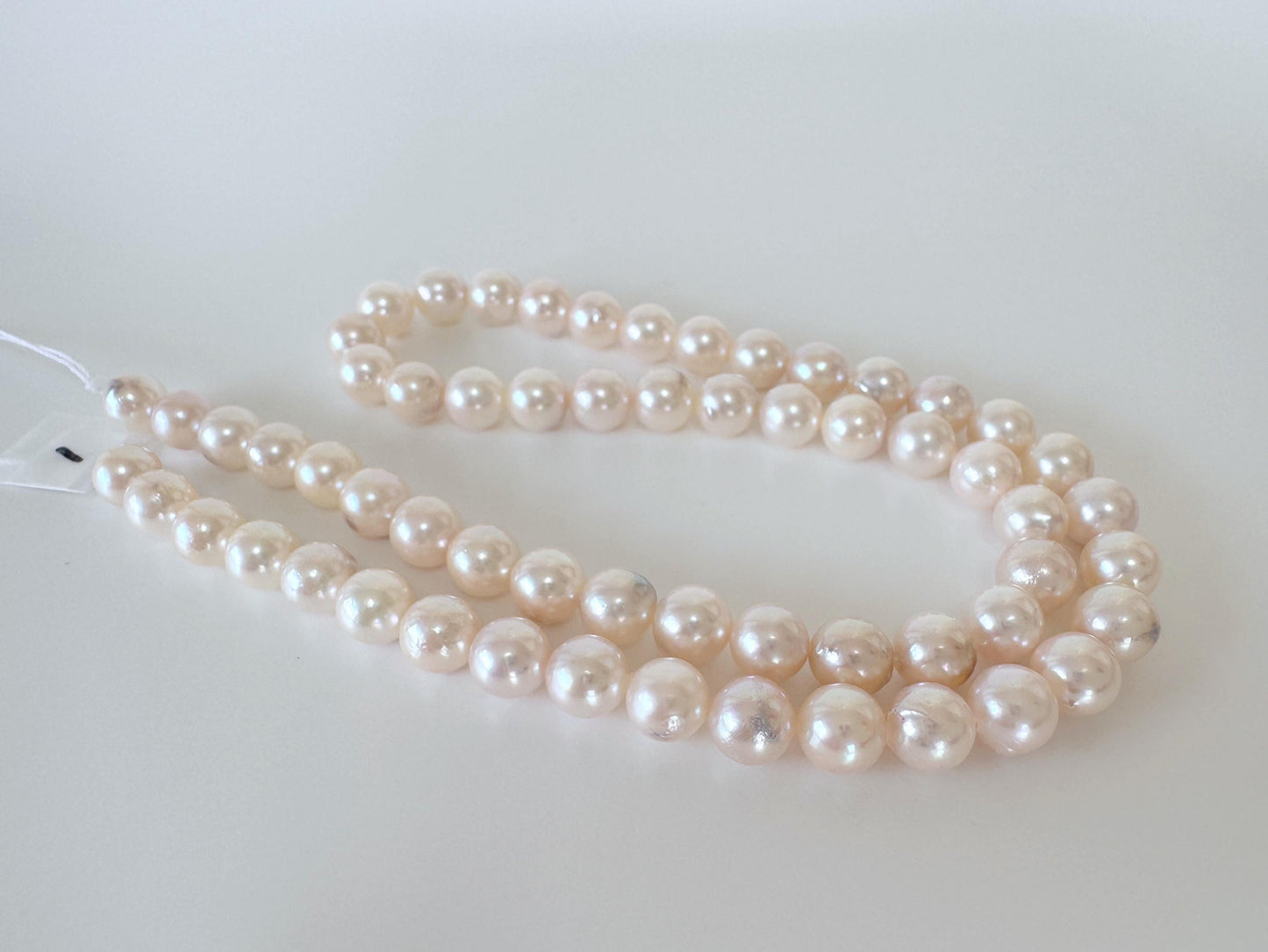 Akoya Pearl Strand: 6.5-7mm White/Pink Cultured Saltwater Pearls