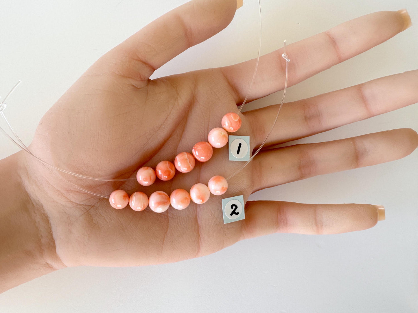 Short strand (6pc) of Natural Deep sea coral round beads 7.5-8.4mm, natural Pink/Orange color coral
