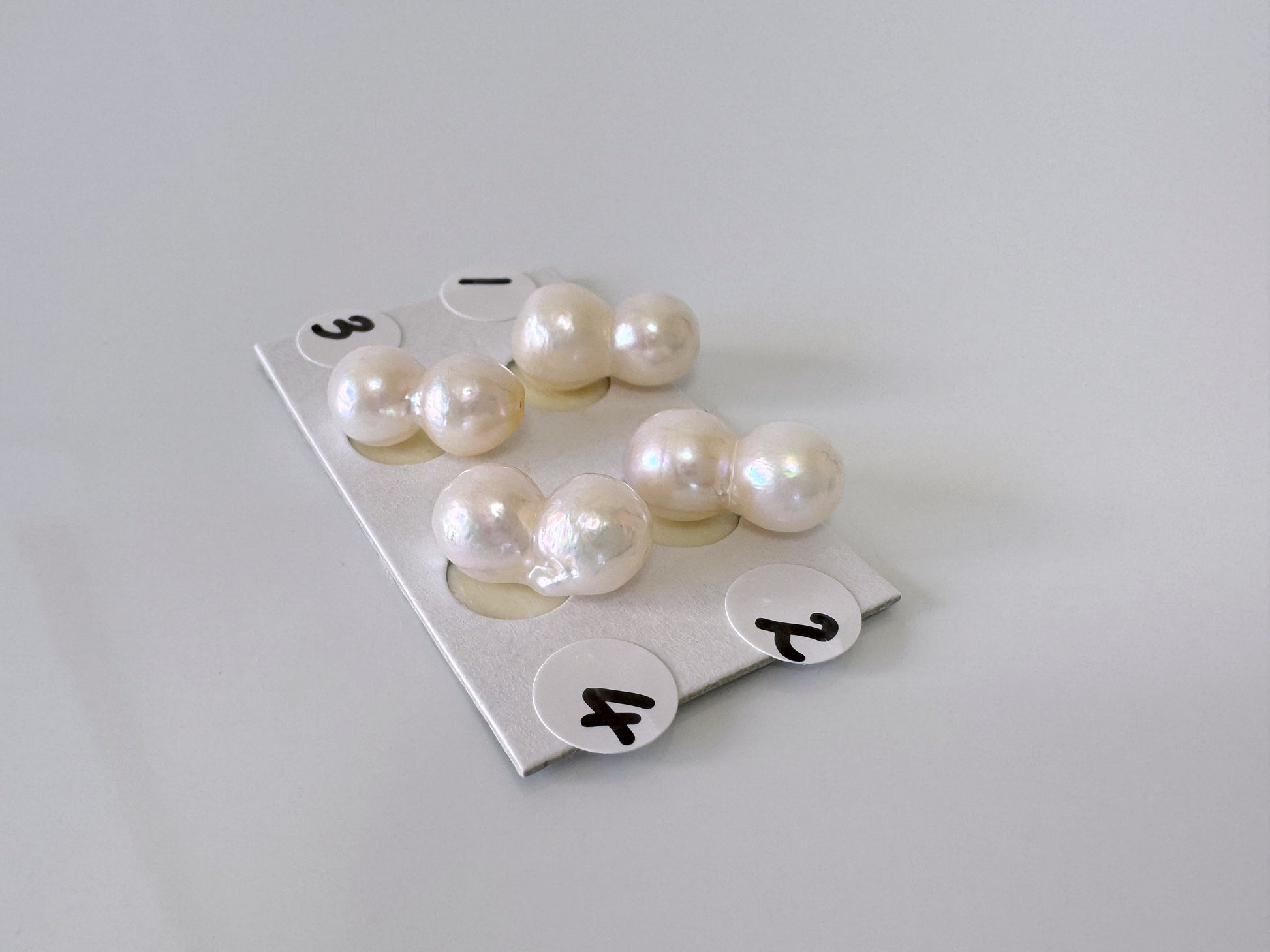 a bunch of pearls sitting on top of a table