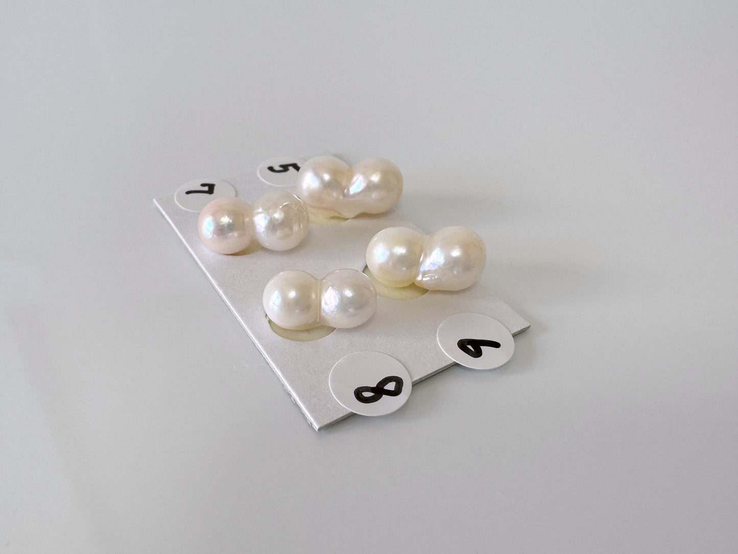 a bunch of pearls sitting on top of a table