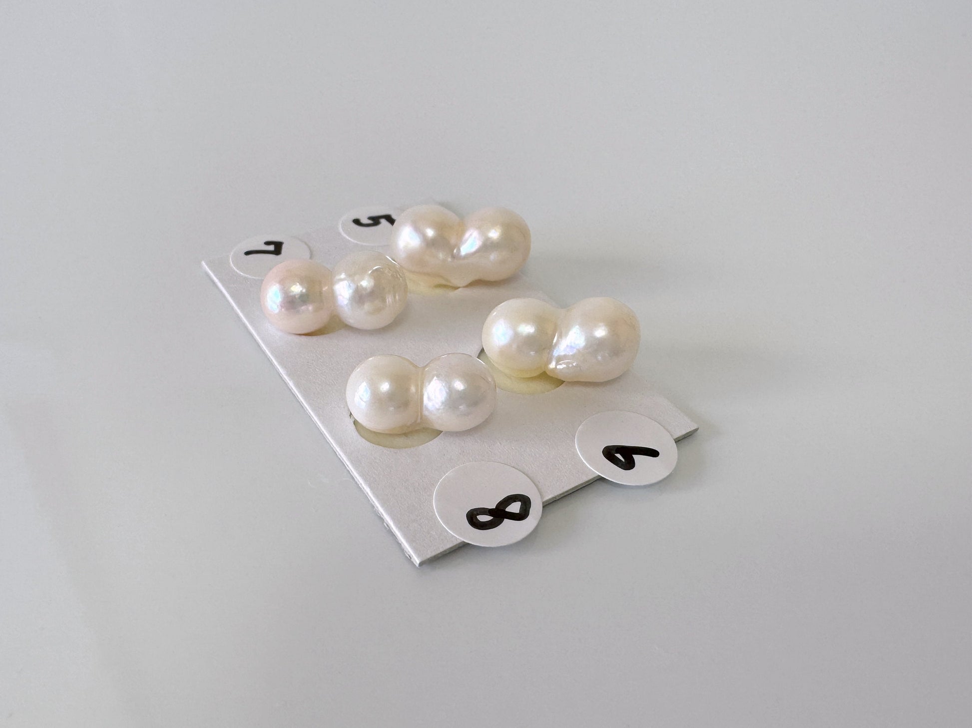 a bunch of pearls sitting on top of a table