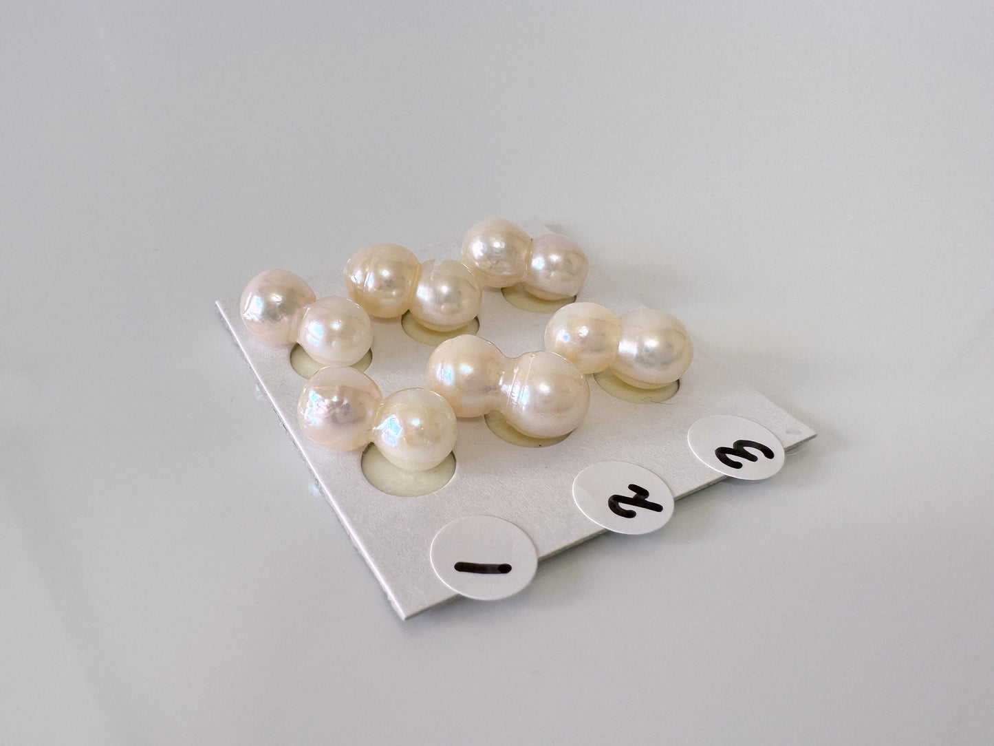 a bunch of pearls sitting on top of a table